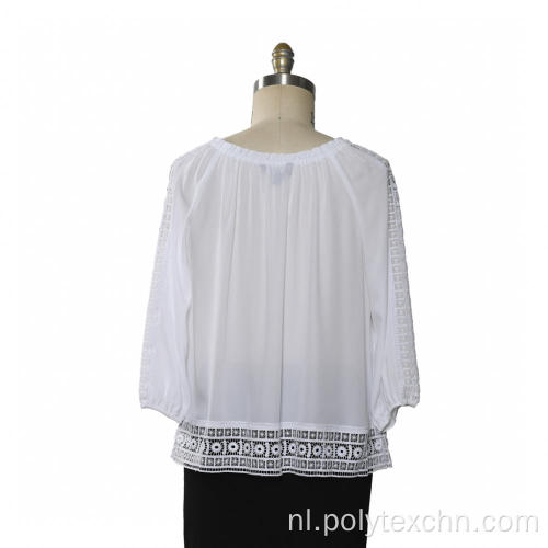 Damesblouse met 3/4 mouwen kanten afwerking